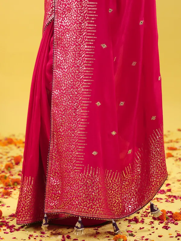 Magenta silk saree with purple blouse for wedding
