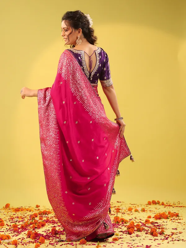 Magenta silk saree with purple blouse for wedding