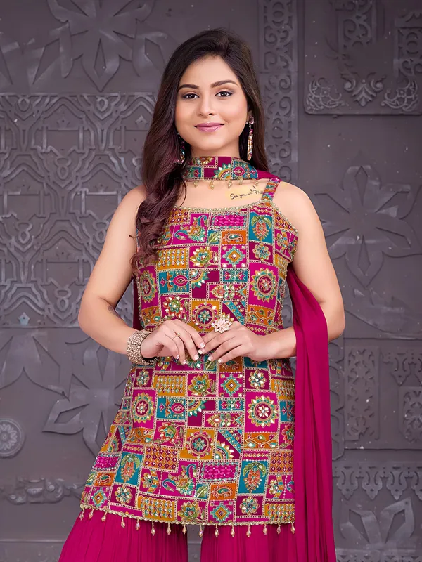 Magenta silk sharara suit with mirror work for festive