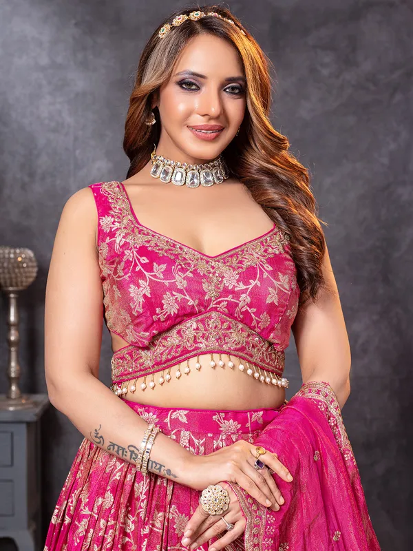 Magenta tissue silk lehenga choli with intricate zari