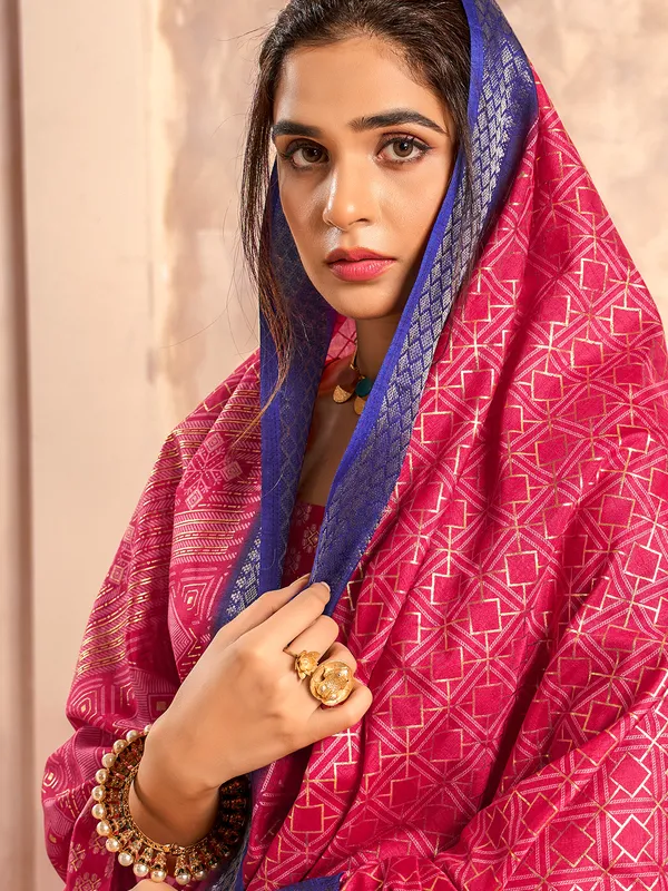 Magenta zari worked dola silk saree