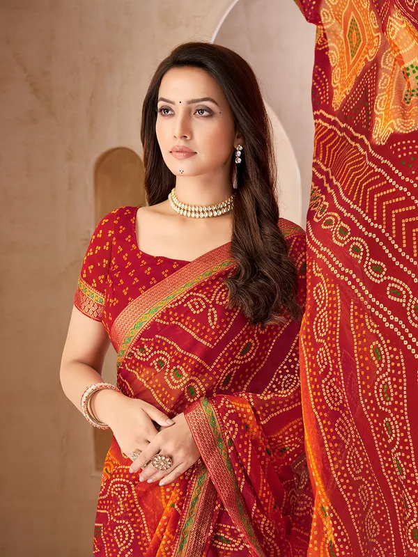 Maroon festive wear chiffon saree with bandhani print