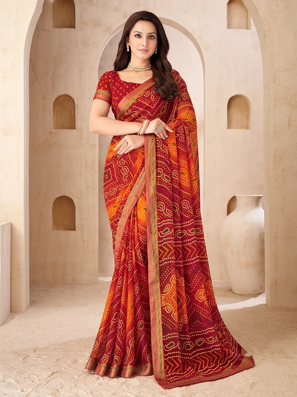 Maroon festive wear chiffon saree with bandhani print