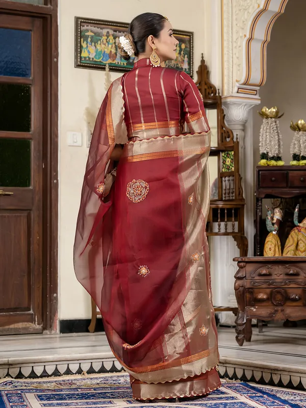 Maroon linen saree with zari weaving for celebrations