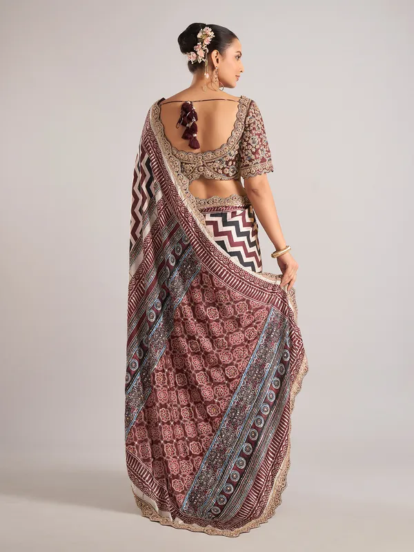 Maroon modal silk saree with zigzag pattern