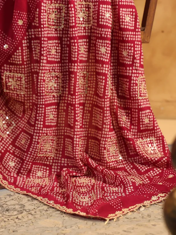 Maroon printed silk saree with aabla and gota accents