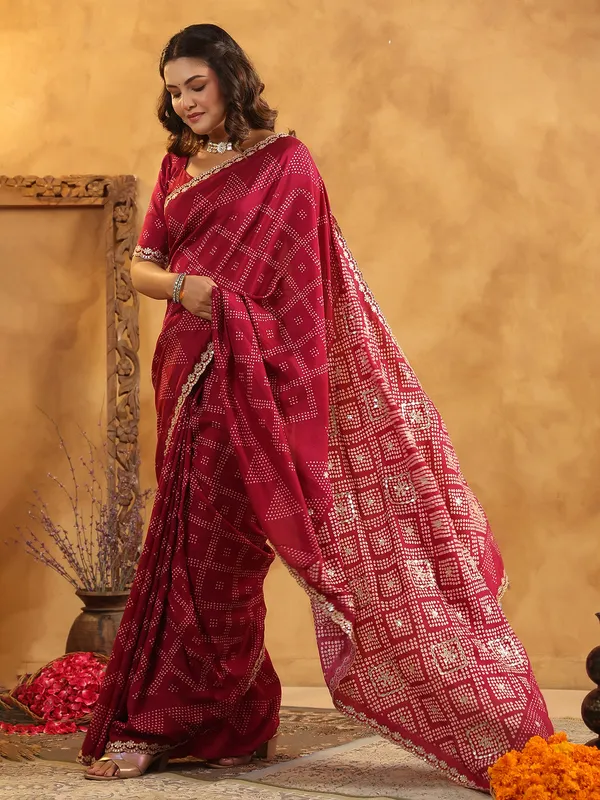 Maroon printed silk saree with aabla and gota accents