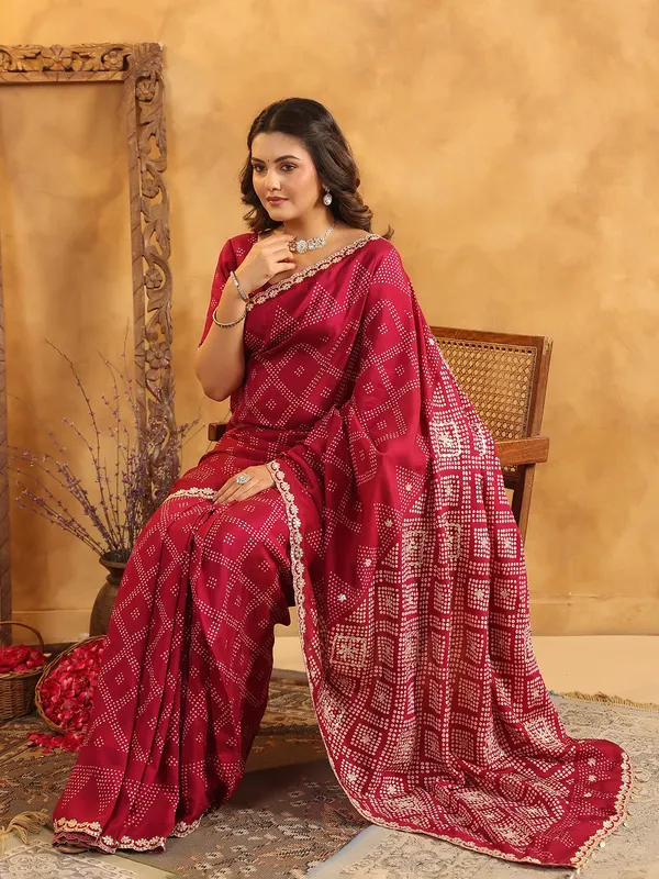 Maroon printed silk saree with aabla and gota accents