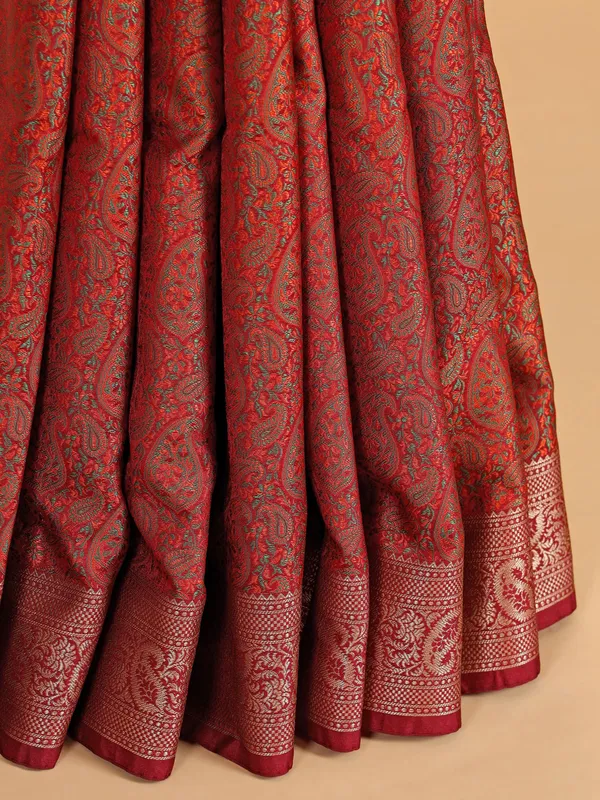 Maroon printed silk saree with zari weaving