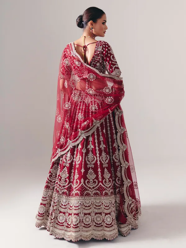 Maroon raw silk lehenga choli with zardosi and resham glow