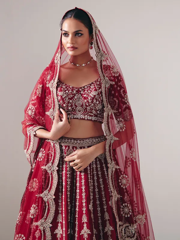 Maroon raw silk lehenga choli with zardosi and resham glow