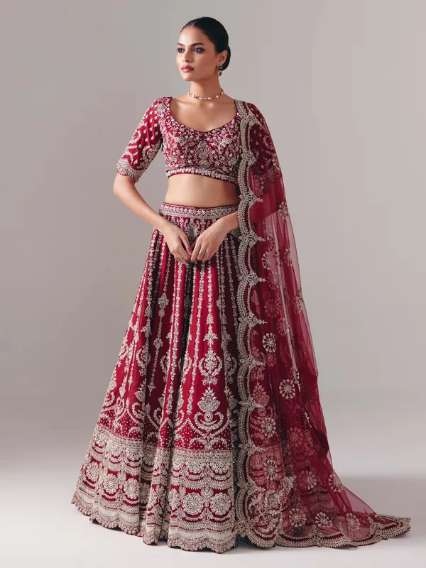 Maroon raw silk lehenga choli with zardosi and resham glow