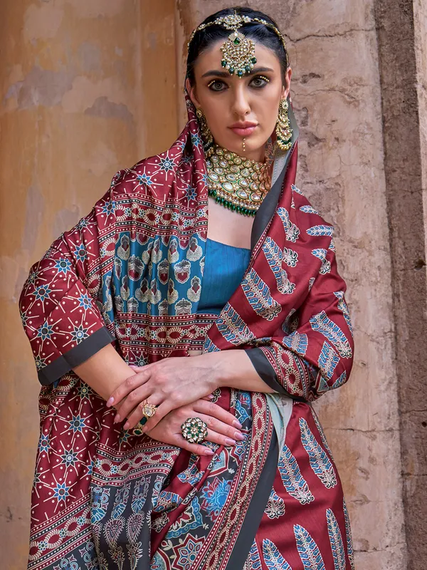 Maroon silk printed saree with unstitched blouse