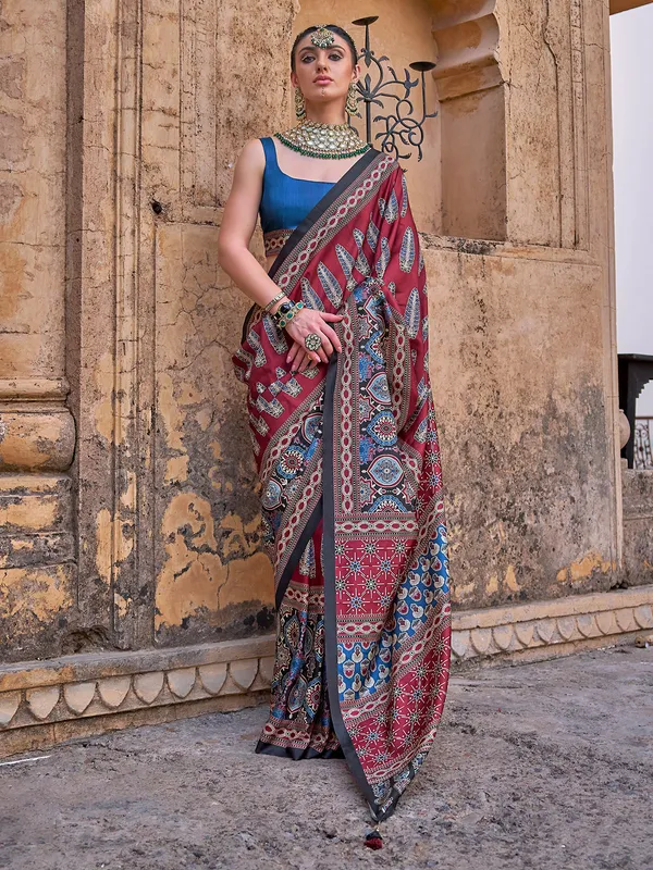 Maroon silk printed saree with unstitched blouse