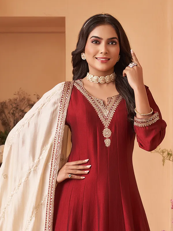 Maroon silk salwar suit with cream dupatta
