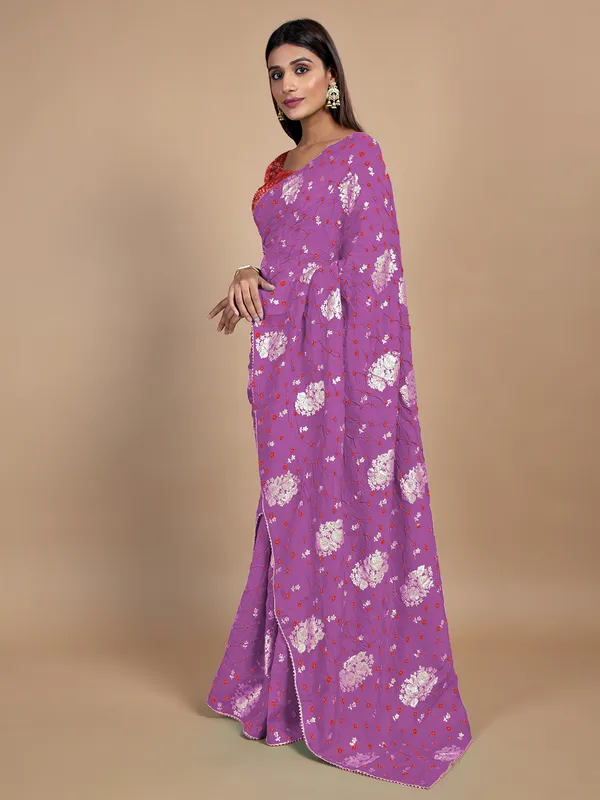 Mauve pink printed festive look bandhej saree