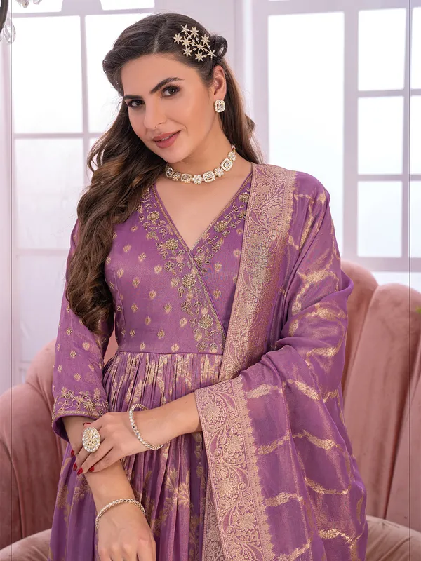 Mauve pink zari weaving anarkali suit