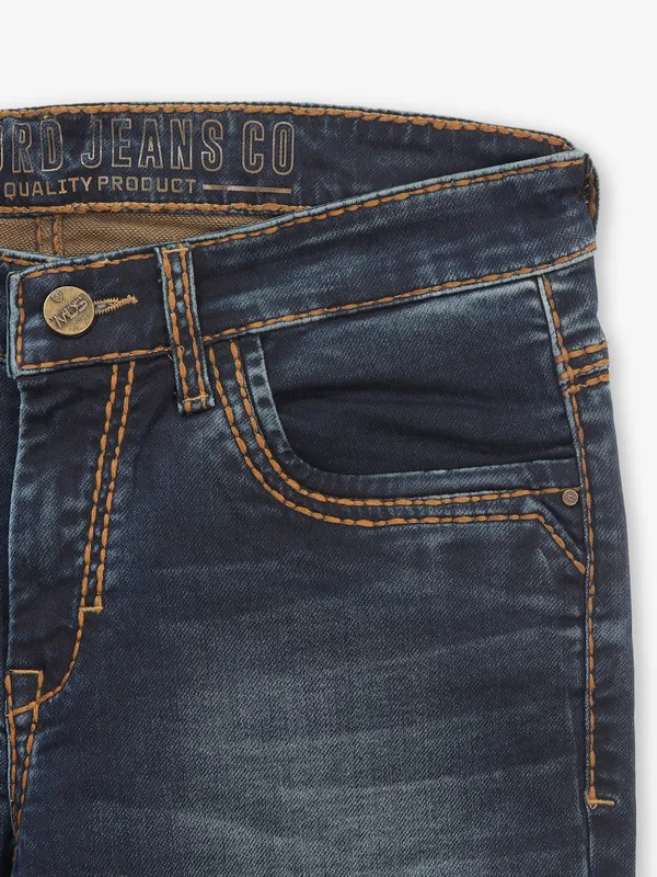 MD SWORD washed dark tonned navy denim jeans