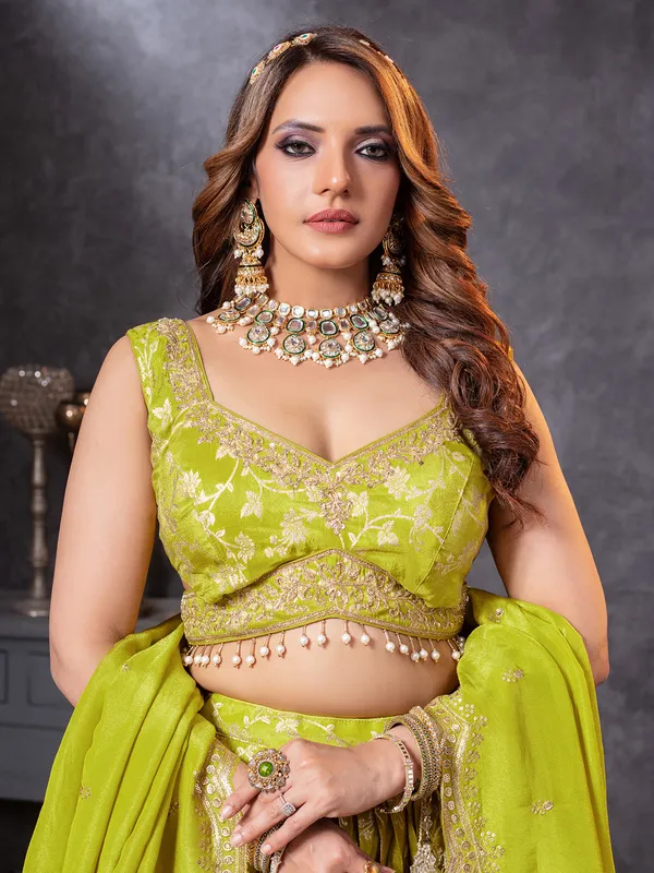 Mehendi green lehenga choli with sleeveless style