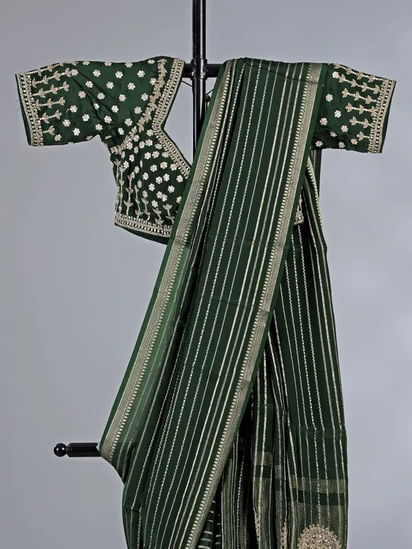 Mehendi green organza saree with sparkling zari work