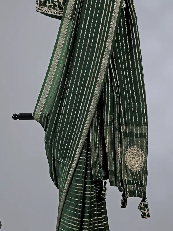 Mehendi green organza saree with sparkling zari work