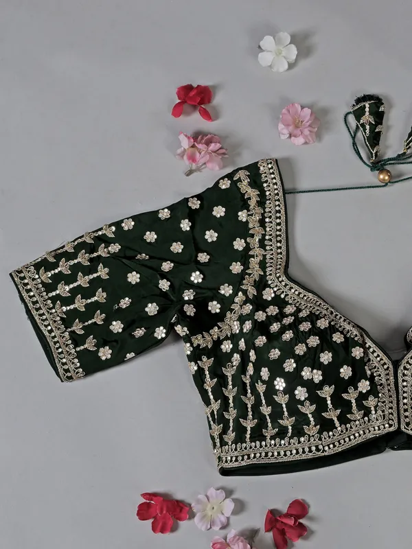 Mehendi green organza saree with sparkling zari work