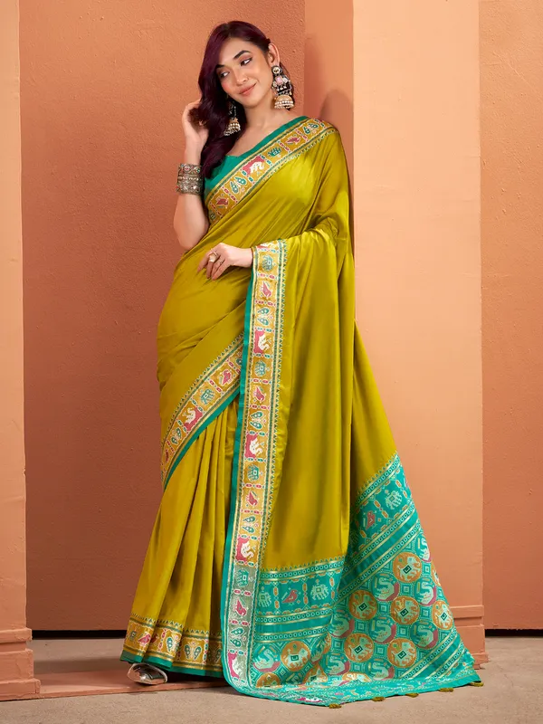 Mehendi green patola saree with traditional flair
