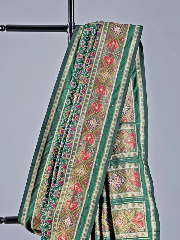 Mehendi green printed saree with traditional embellishments