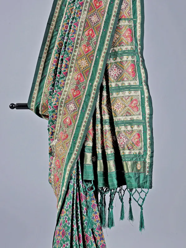 Mehendi green printed saree with traditional embellishments