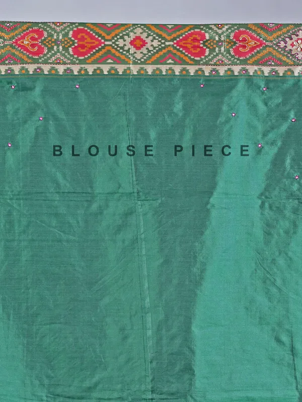 Mehendi green printed saree with traditional embellishments
