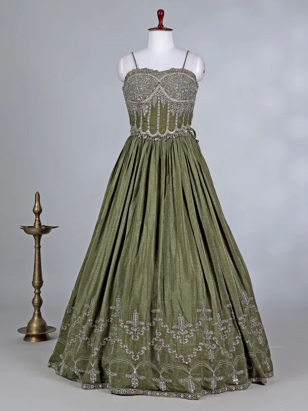Mehendi green silk lehenga choli with cutdana glow