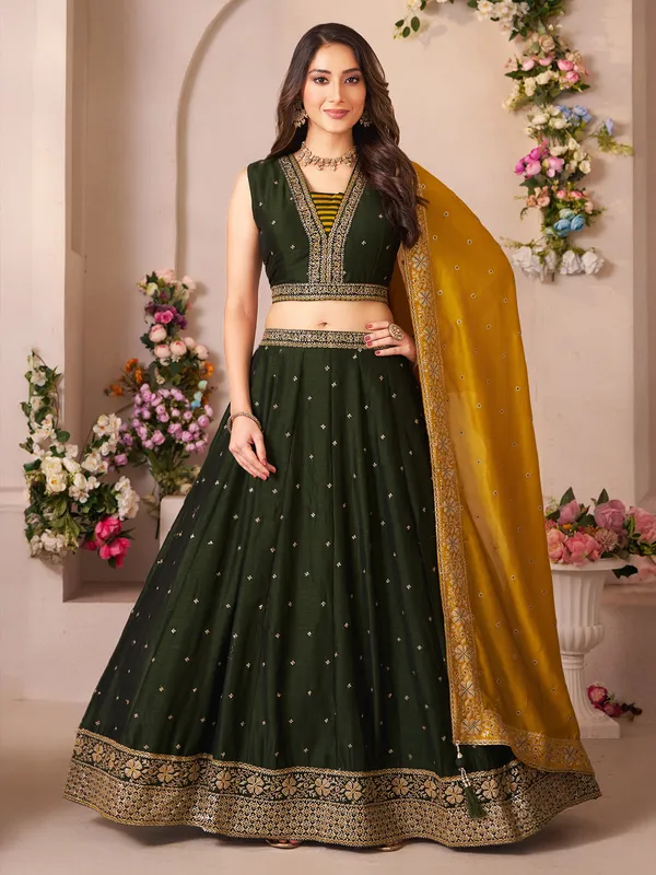 Mehendi green silk lehenga choli with subtle traditional sparkle