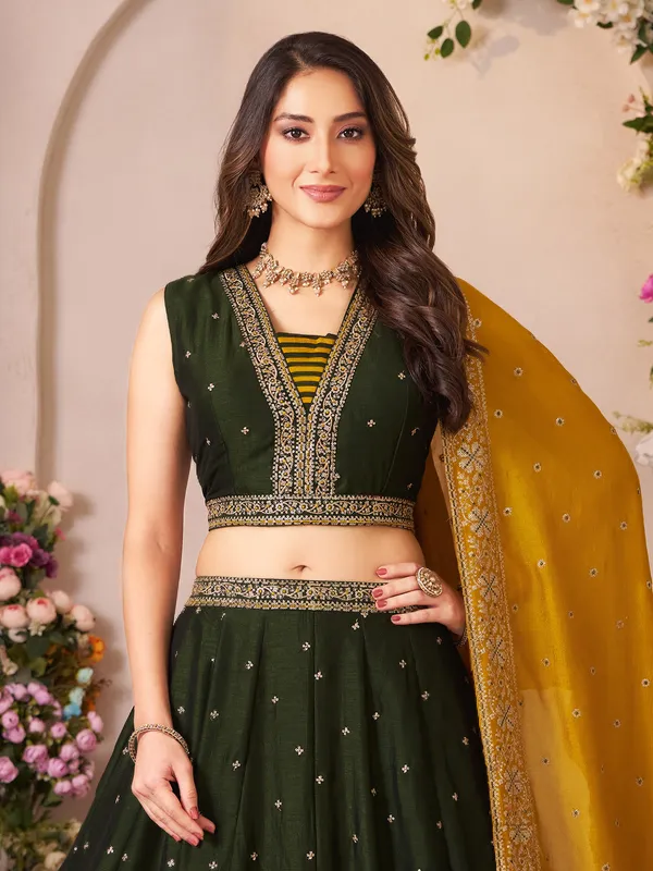 Mehendi green silk lehenga choli with subtle traditional sparkle