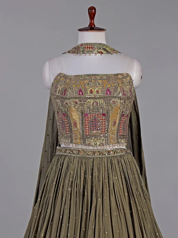 Mehendi green silk lehenga choli with zardosi accents