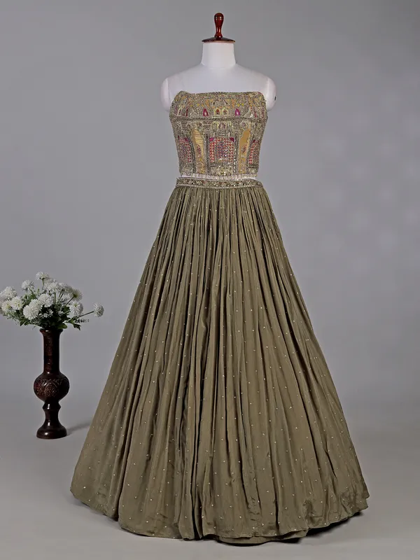 Mehendi green silk lehenga choli with zardosi accents