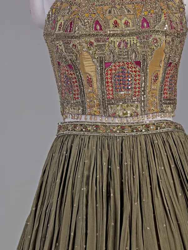 Mehendi green silk lehenga choli with zardosi accents
