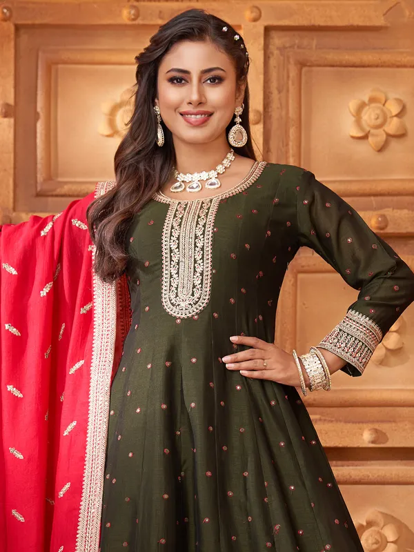 Mehendi green silk salwar suit with red dupatta