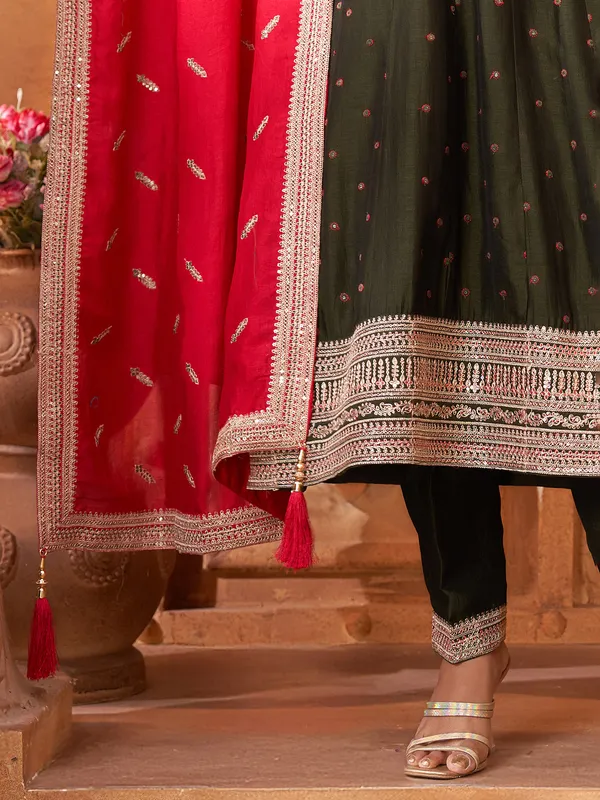Mehendi green silk salwar suit with red dupatta
