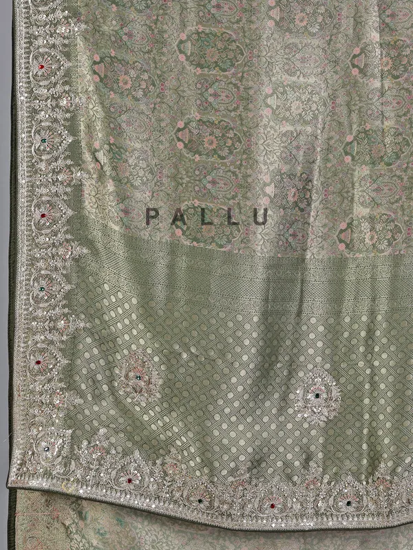 Mehendi green tissue silk saree with stone and sequin detailing