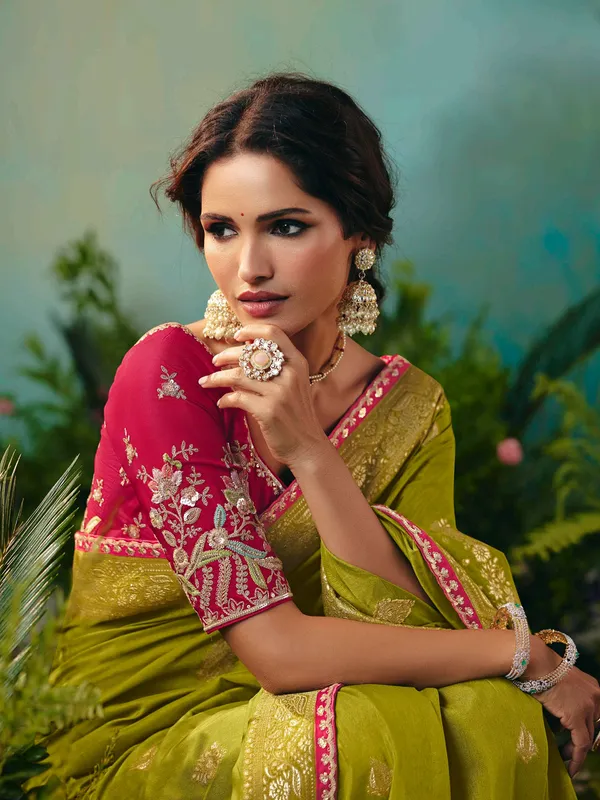 Mehendi green viscose dola silk saree with zari work