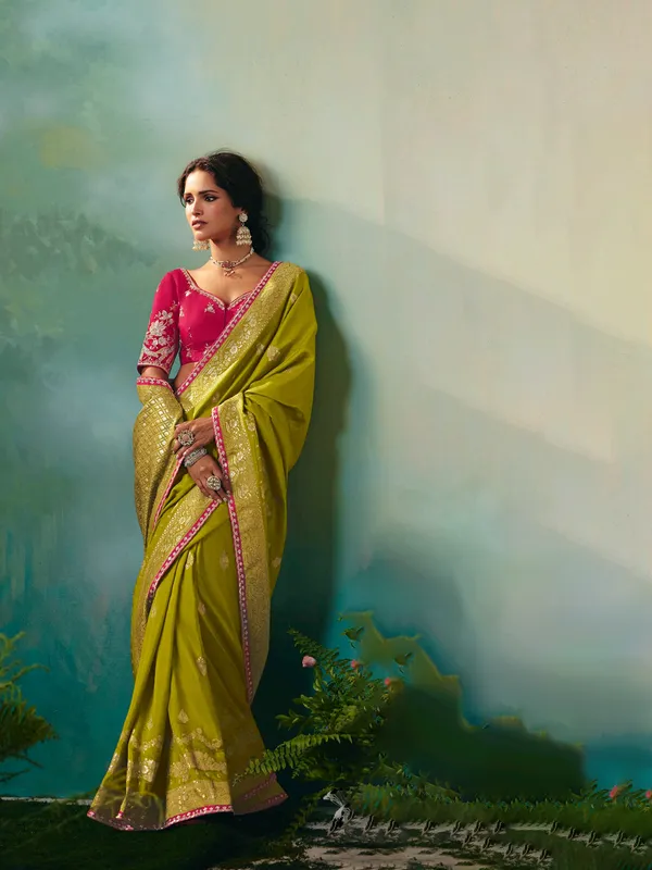 Mehendi green viscose dola silk saree with zari work