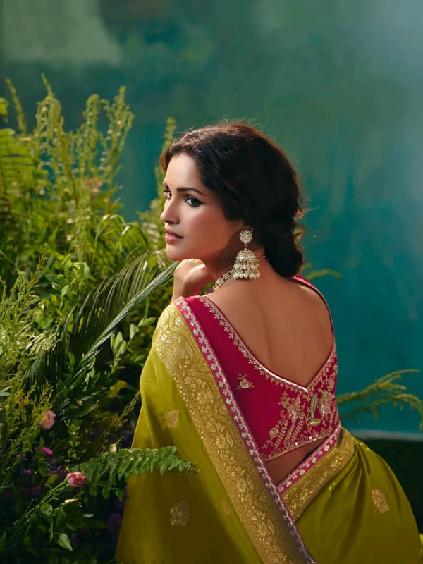 Mehendi green viscose dola silk saree with zari work