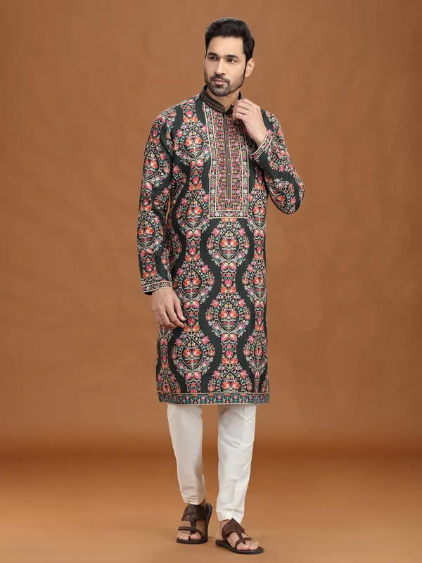 Mehendi green viscose kurta suit for festivities