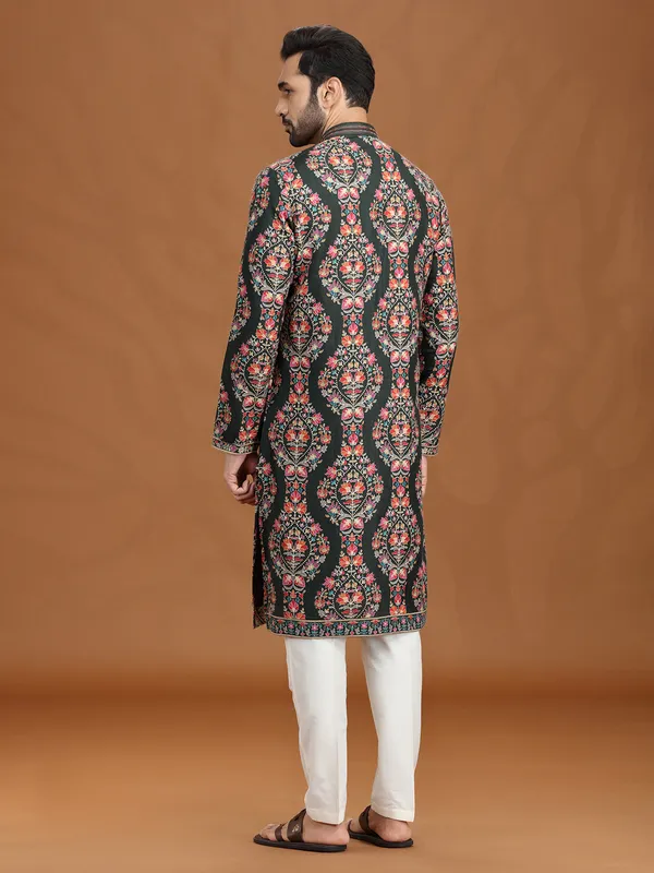 Mehendi green viscose kurta suit for festivities