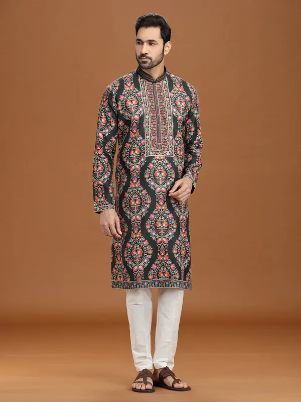 Mehendi green viscose kurta suit for festivities