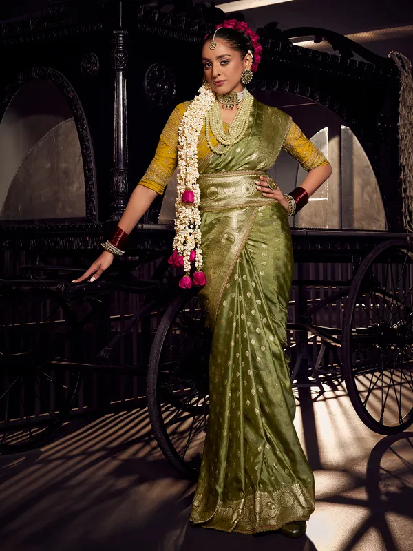 Mehendi green viscose tissue silk saree for festive occasion