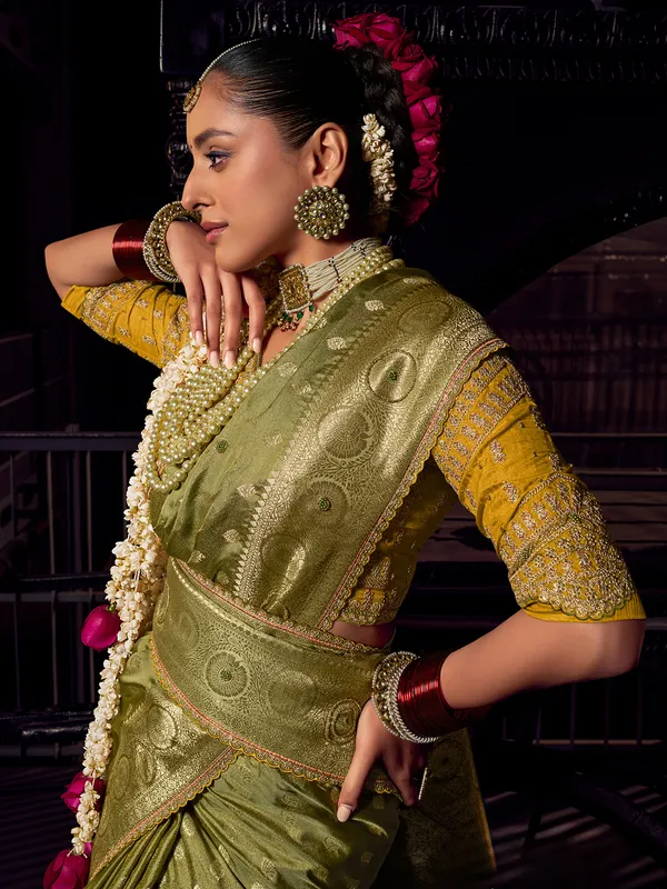 Mehendi green viscose tissue silk saree for festive occasion