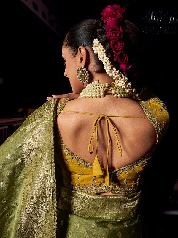 Mehendi green viscose tissue silk saree for festive occasion