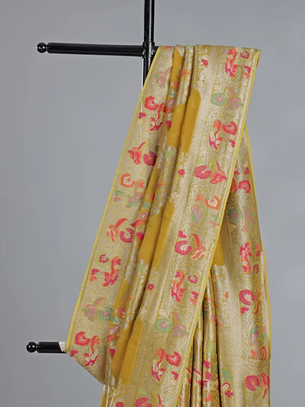Mehendi yellow dola silk saree with colorful motifs