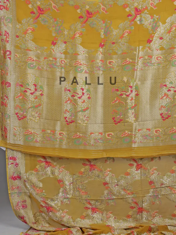 Mehendi yellow dola silk saree with colorful motifs